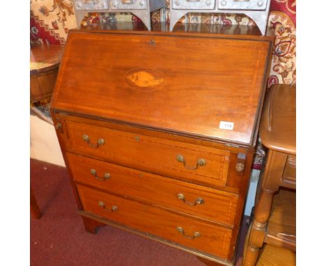 An Edwardian inlaid mahogany bureau with fall front and fitted interior above three drawers on bracket feet 