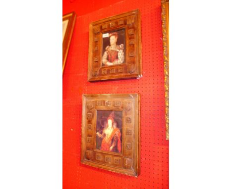 A pair of portrait prints in handmade plaster frames