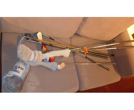 A collection of golf clubs including a c.1900 putter by R. Forgan and Son of St. Andrews