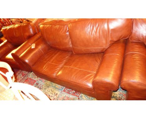 A contemporary brown leather two seater sofa 