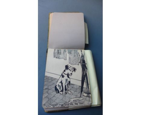 An Edwardian sketch book, complete with several drawings and paintings including a cartoon of a dog 