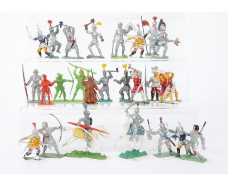 A selection of solid plastic knights,  Crescent foot (24), mounted (4, only two horses), Hong Kong copies (8), Kelloggs (18),