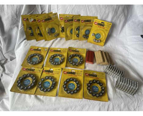 TWENTY EIGHT CORGI ITEMS - SIXTEEN SETS OF GOLDEN JACKS INTERCHANGEABLE WHEELS (NINE SETS INCOMPLETE) AND TWELVE METAL TRAILE