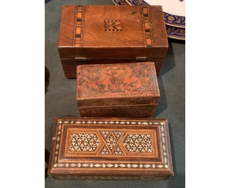 THREE TREEN LIDDED BOXES TO INCLUDE A CIGARETTE BOX AND A TEA CADDY 