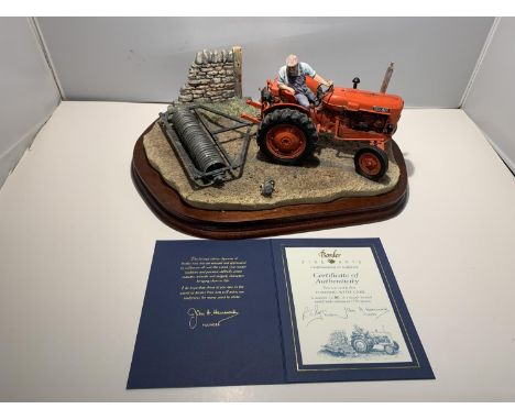 A LARGE LIMITED EDITION BORDER FINE ARTS FIGURINE OF A NUFFIELD TRACTOR WITH A ROLLER - TURNING WITH CARE- 1190/1750 WITH CER