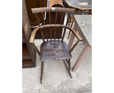 AN ERCOL STYLE ROCKING CHAIR 