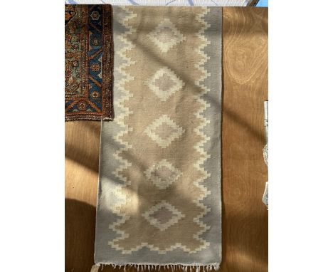 A TRIBAL KALIM FRINGED CARPET RUNNER 