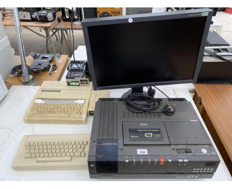 A RETRO BETAMAX VIDEO CASSETTE RECORDER, A FLEXSCAN SX2462WAND TWO RETRO KEYBOARDS 