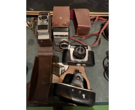 A COLLECTION OF THREE CAMERAS TO INCLUDEA GB BELL AND HOWELL 624EE AUTOSET, A PACEMAKER RECTAMAT AND A KODAK EKTANAR 