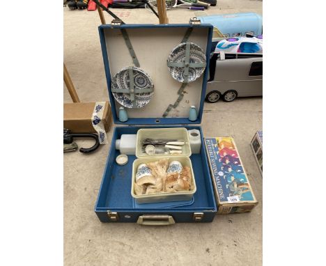 A PICNIC HAMPER AND A PORTABLE SEWING MACHINE 