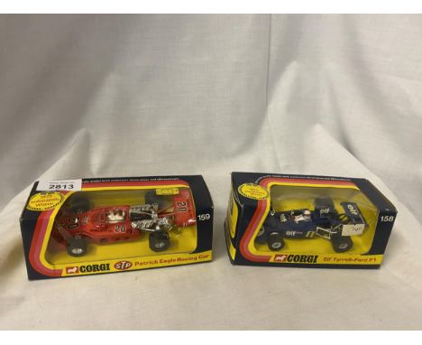 TWO CORGI MODEL RACING CARS - ELF TYRELL FORD F1 AND STP PATRICK EAGLE RACING CAR NUMBERS 158 AND 159 IN ORIGINAL BOXES 