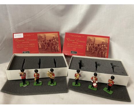 TWO BOXED BRITAINS SCOTS GUARDS WITH THE STATE COLOUR THREE PIECE MODEL SOLDIER SETS - NUMBER 40202 AND 40106 