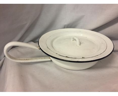 A VINTAGE WHITE ENAMEL LIDDED PAN 