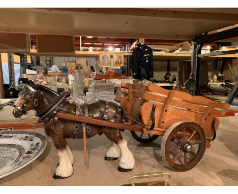 A LARGE MELBA HORSE AND WOODEN CART 