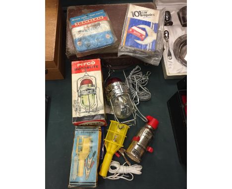 A MIXED COLLECTION TO INCLUDE A PIFCO MOTORLITE LAMP, VONTAGE JOHNSONS TRAVEL KIT TIN , 101 CAR REPAIRS BOOKLET , SMALL LEATH