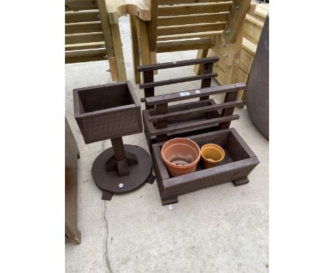 A PAIR OF WOODEN PLANTER TROUGHS AND A FURTHER WOODEN PLANTER 