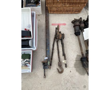 A LARGE VINTAGE SASH CLAMP AND A PULLEY SYSTEM 
