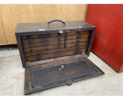 A MINITURE WOODEN ENGINEERS CHEST WITH AN ASSORTMENT OF TOOLS INCLUDED 