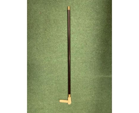 A WALING STICK WITH A BONE NOVELTY HEAD HANDLE 