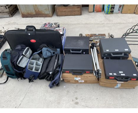 A LARGE ASSORTMENT OF PHOTOGRAPHIC SLIDES, CAMERA BAGS AND A TRIPOD STAND ETC 