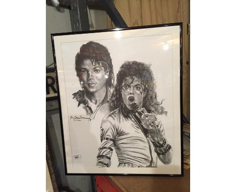 A FRAMED PRINT OF A PORTRAIT OF MICHAEL JACKSON 