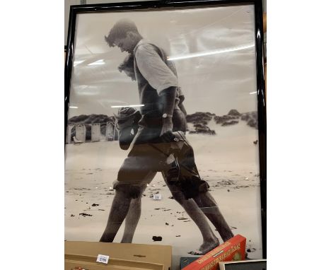 A VERY LARGE KODAK BLACK AND WHITE FRAMED 1940'S/1950'S PRINT OF TWO BOYS ON THE BEACH 156CM X 106CM 