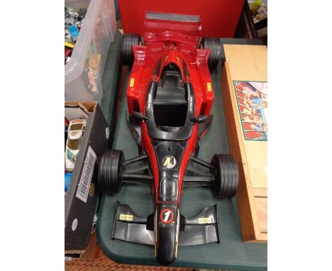 AN ACTION MAN RED RACING CAR 