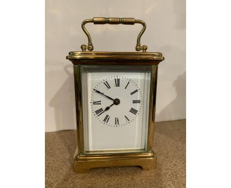 A BRASS CARRIAGE MANTLE CLOCK 