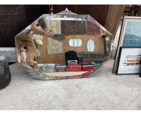 AN ART DECO BEVELED EDGE UNFRAMED MIRROR 