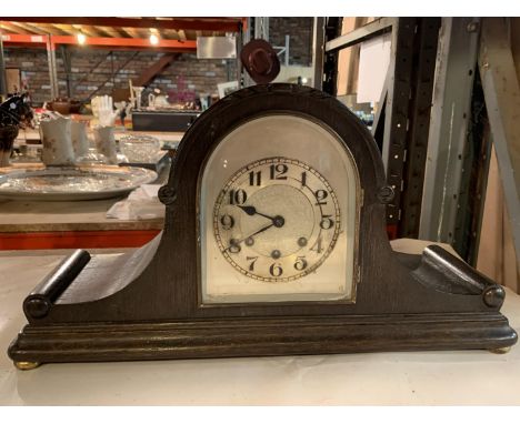 A LARGE MAHOGANY NAPOLEONS HAT MANTLE CLOCK WITH KEY 