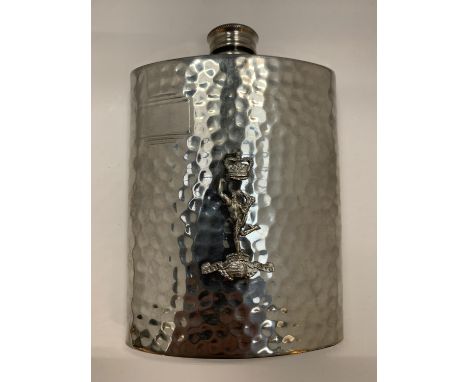 A MILITARY PEWTER HIP FLASK WITH A CREST 