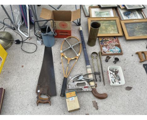 AN ASSORTMENT OF ITEMS TO INCLUDE A HOCKEY STICK, A RACKET WITH PRESS, AND A INFRAPHIL LAMP ETC 