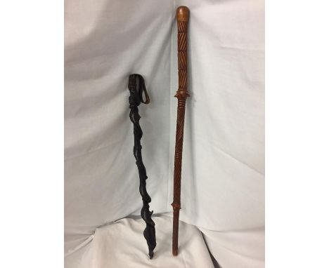 A SHILLELAGH IRISH BLACKTHORN STICK AND AN ORIENTAL WOODEN STICK 