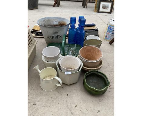 AN ASSORTMENT OF CERAMIC PLANTERS AND GLASSWARE 