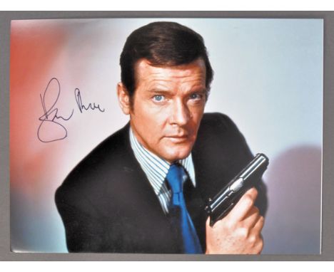 The Julian Glover Auction - Sir Roger Moore (1927-2017) - James Bond 007 - an impressive signed 16x12" colour photograph of M
