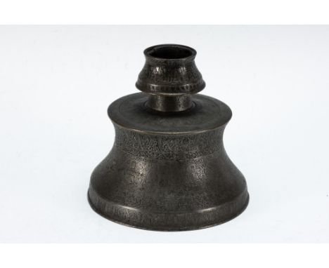 An Islamic Mamluk Candlestick with Islamic Inscriptions and Figures of Zodiac Symbols from the 13th Century.H: Approximately 