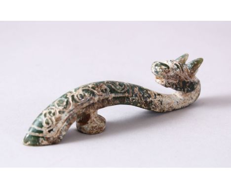 A CHINESE CARVED JADE ARCHAIC STYLE CHILONG BELT BUCKLE, 10cm long.