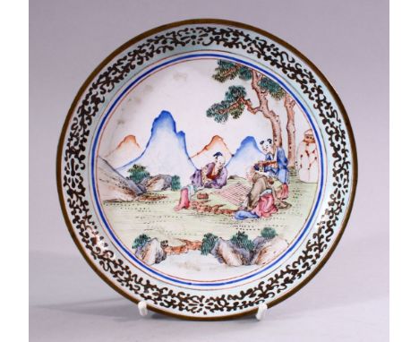 A 19TH / 20TH CENTURY CHINESE WHITE ENAMEL DISH, the dish decorated with scenes of figures seated in landscape settings, poss