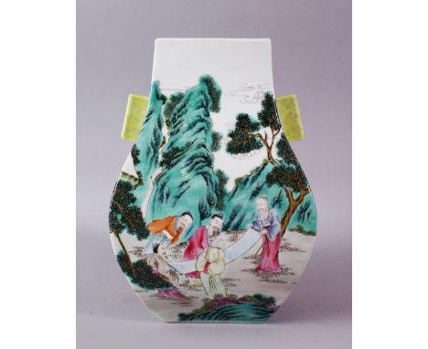 A CHINESE FAMIILE ROSE PORCELAIN HU SHAPED TWIN HANDLE IMMORTAL VASE, decorated with scene of immortal figures in landscapes,