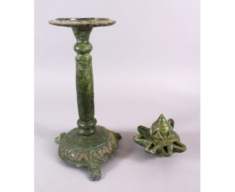 A UNUSUAL EARLY ISLAMIC POTTERY OIL LAMP ON STAND, 46cm high.