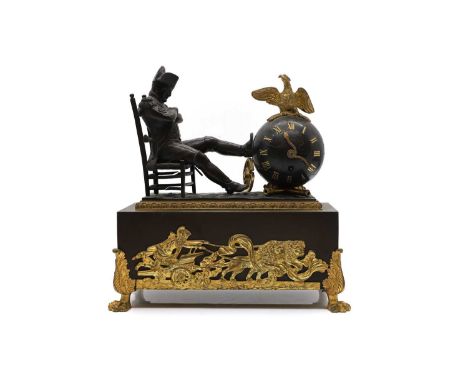 A French Empire bronze and ormolu mantle clock surmounted by a figure of Napoleon resting his foot on a globe, with Roman num