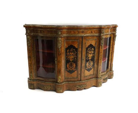 A Victorian walnut and marquetry inlaid credenza with gilt metal mounts, the central doors inlaid with marquetry panels of fl