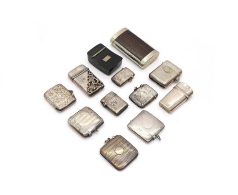 A group of silver vesta cases and snuff boxes with engine-turned and foliate engravings, to include a pierced example, marked