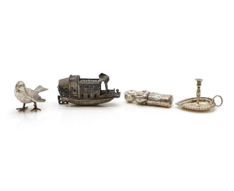 A group of silver novelty items comprising a minature chamberstick, in the form of a heart, 6.5cm wide, a filagree and enamel