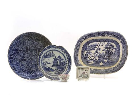 A blue and white transfer ceramic meat plate,  with willow pattern decoration, 43cm wide, a large Chinese Kangxi bowl 35.5cm 