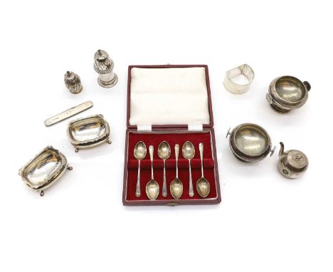 A group of silver cruet items to include a novelty pepperette, in the form of a teapot, 5.5cm high, a pair of salts, Sheffiel