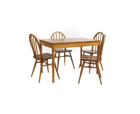 An Ercol elm and beechwood table and chairs table 108cm wide69cm deep71cm high chairs 39cm wide40cm deep84.5cm high seat 43cm