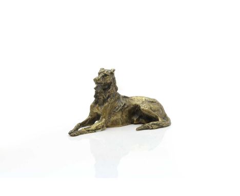 A gilt bronze figure 20th century, possibly French, depicting a resting lurcher dog, 20cm long