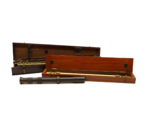 A lacquered brass pantograph, 19th century, by Cary, London, with ivory wheels, cased,70cm long together with a brass rolling