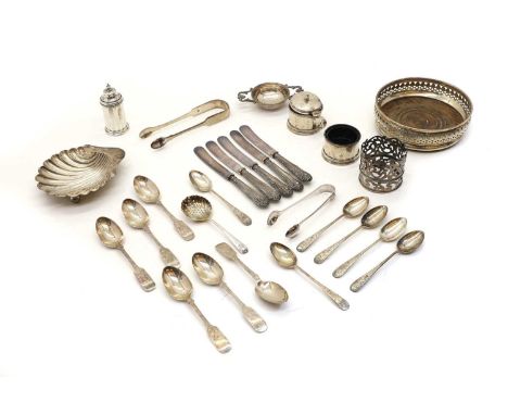 A group of silver items comprising a cruet set by Mappin &amp; Webb Ltd Birmingham 1935, a shell form butter dish by Horace W